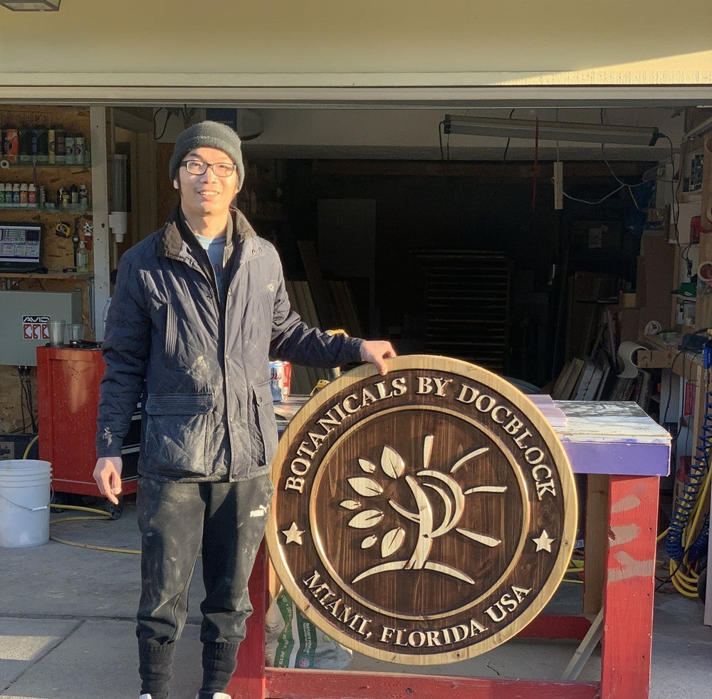 Hoan Dinh, founder of Cornbread Custom Signs, in his Nebraska workshop