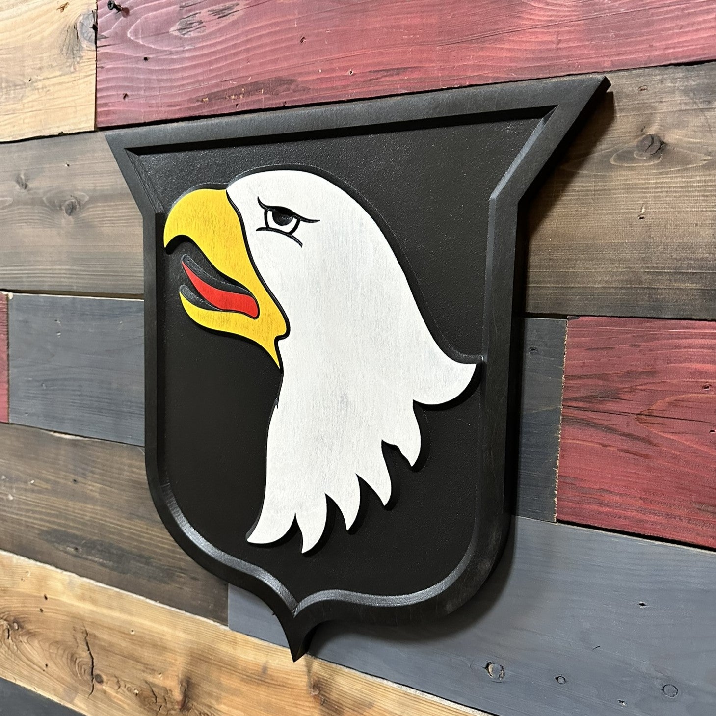 101st Airborne Division Screaming Eagles carved wood patch wall sign mounted on wall