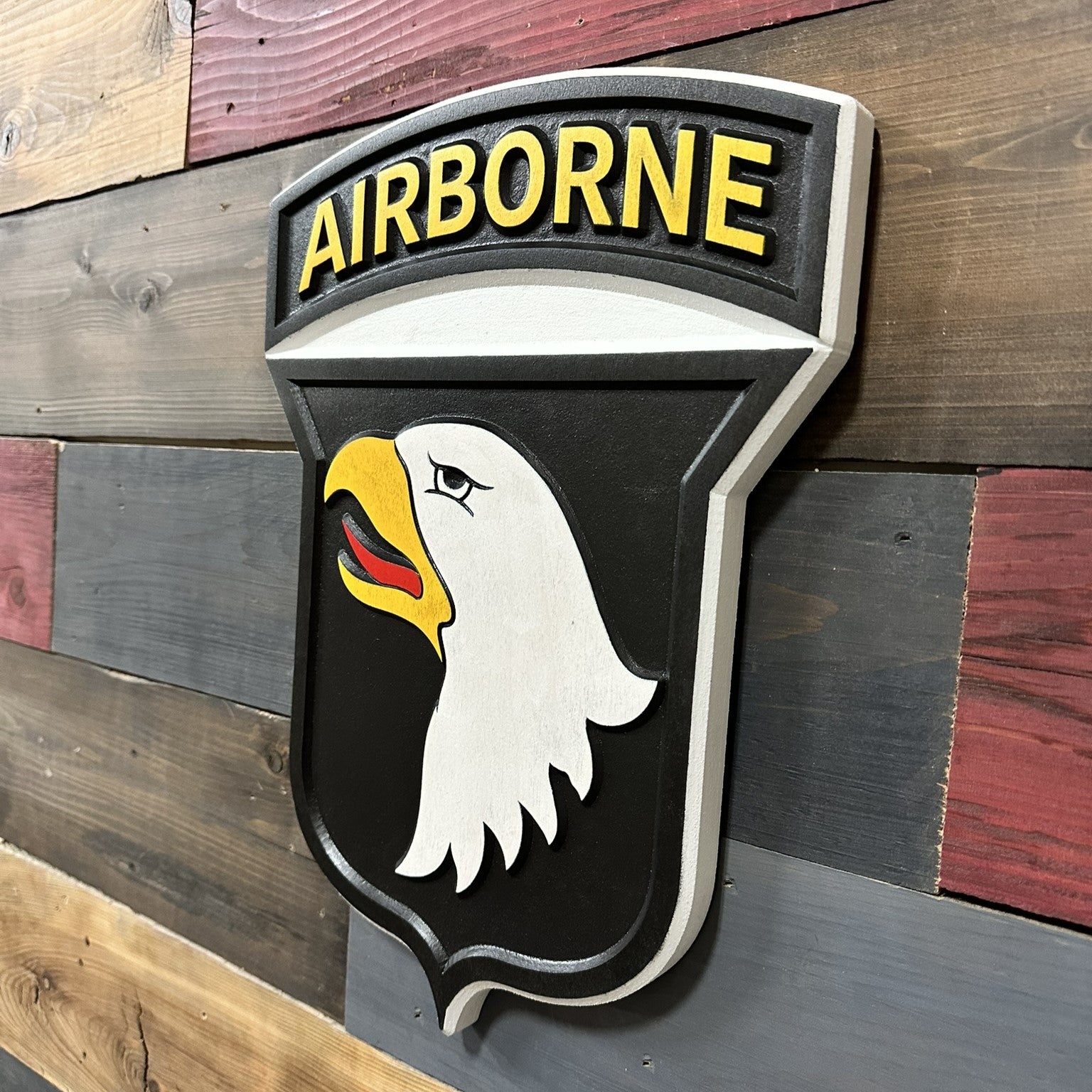 101st Airborne Division Screaming Eagles carved wood wall sign mounted on wall