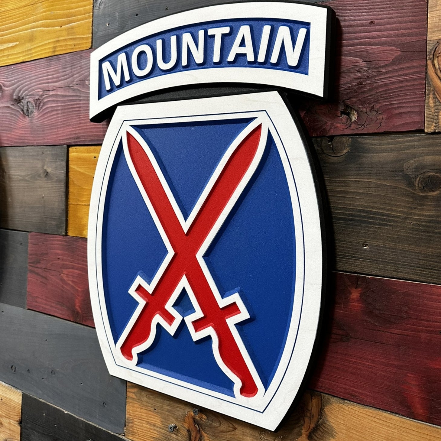 10th Mountain Division wood wall sign displayed on wall handcrafted military insignia decor