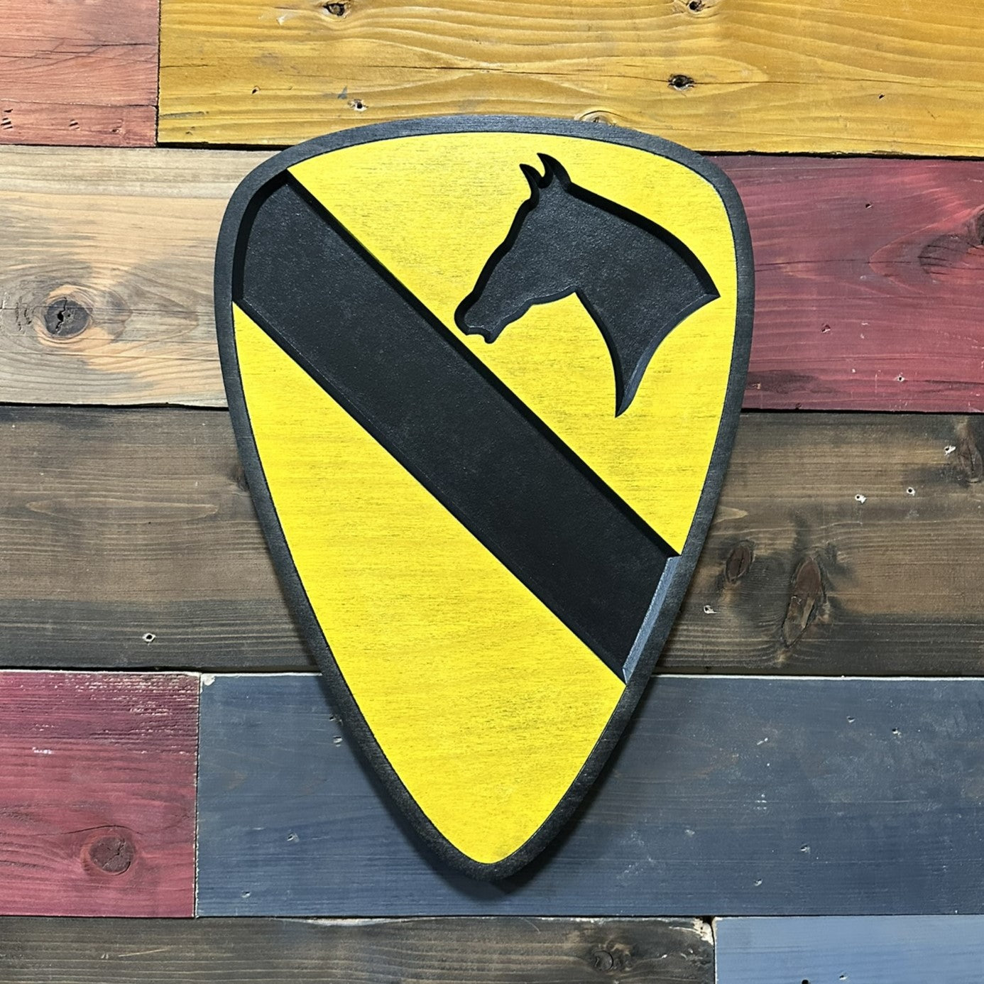 1st Cavalry Division black border carved wood wall sign mounted in home or office setting