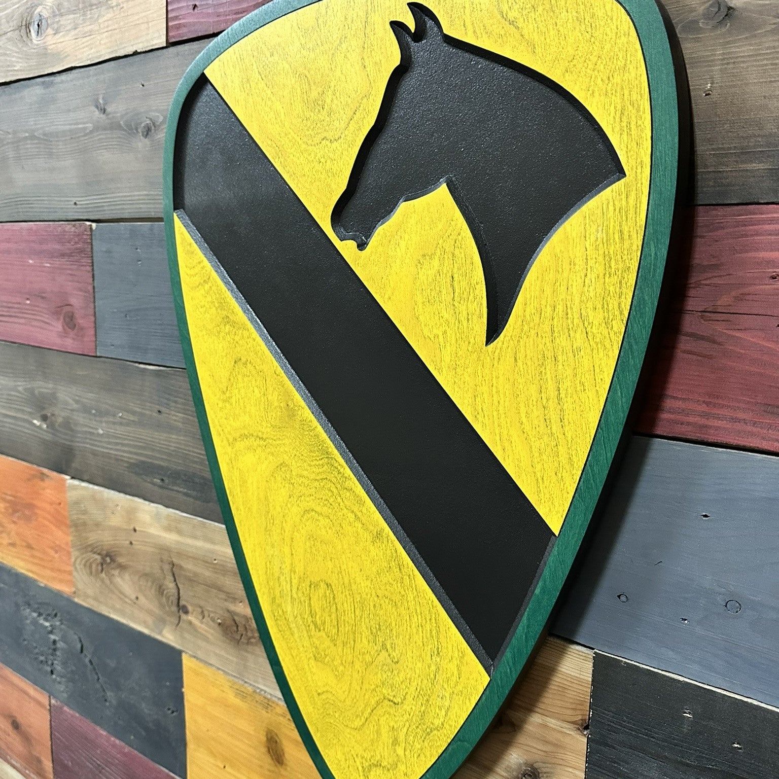 1st Cavalry Division green border carved wood wall decor mounted in home or office setting