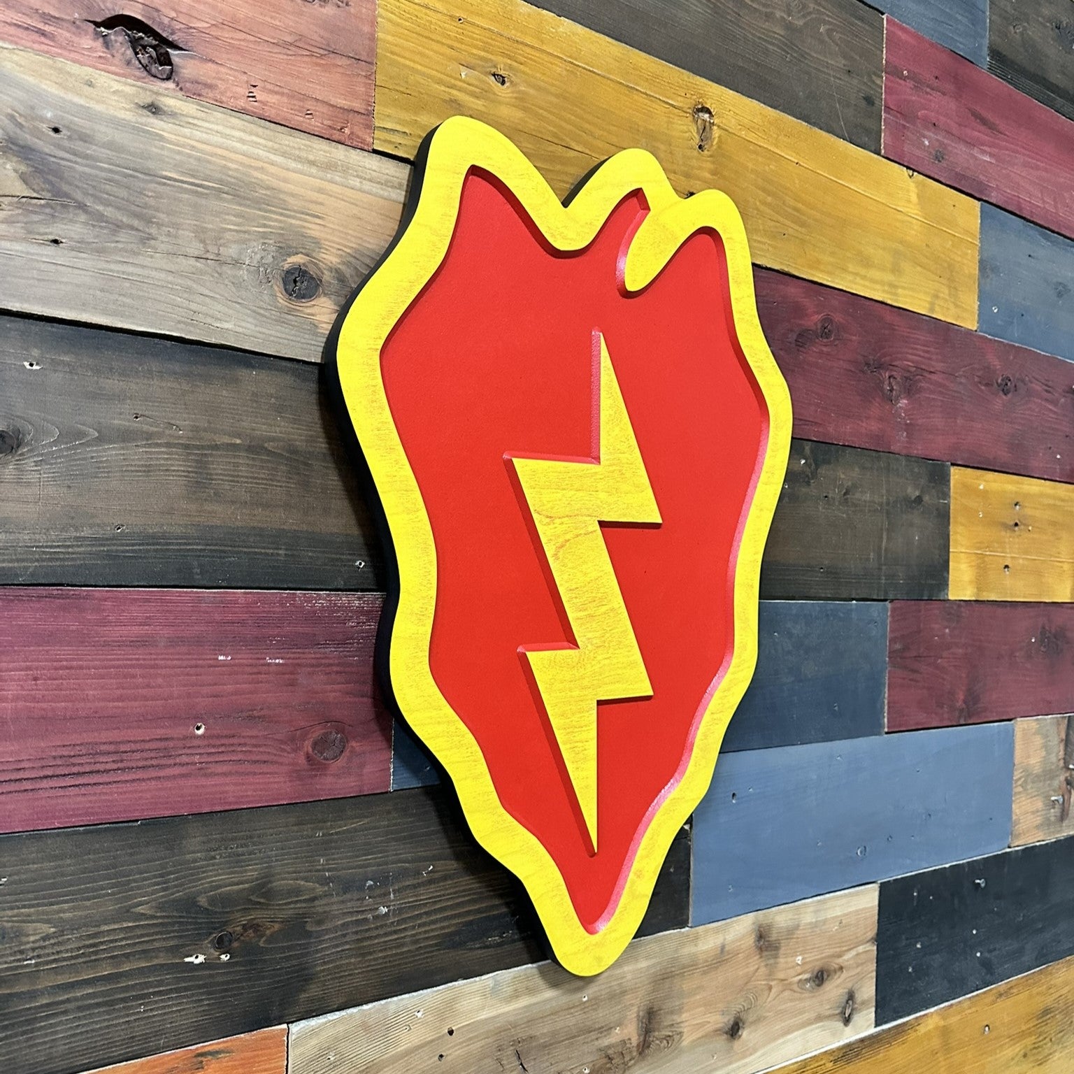 25th Infantry Division Tropic Lightning carved wood wall sign mounted in home or office setting