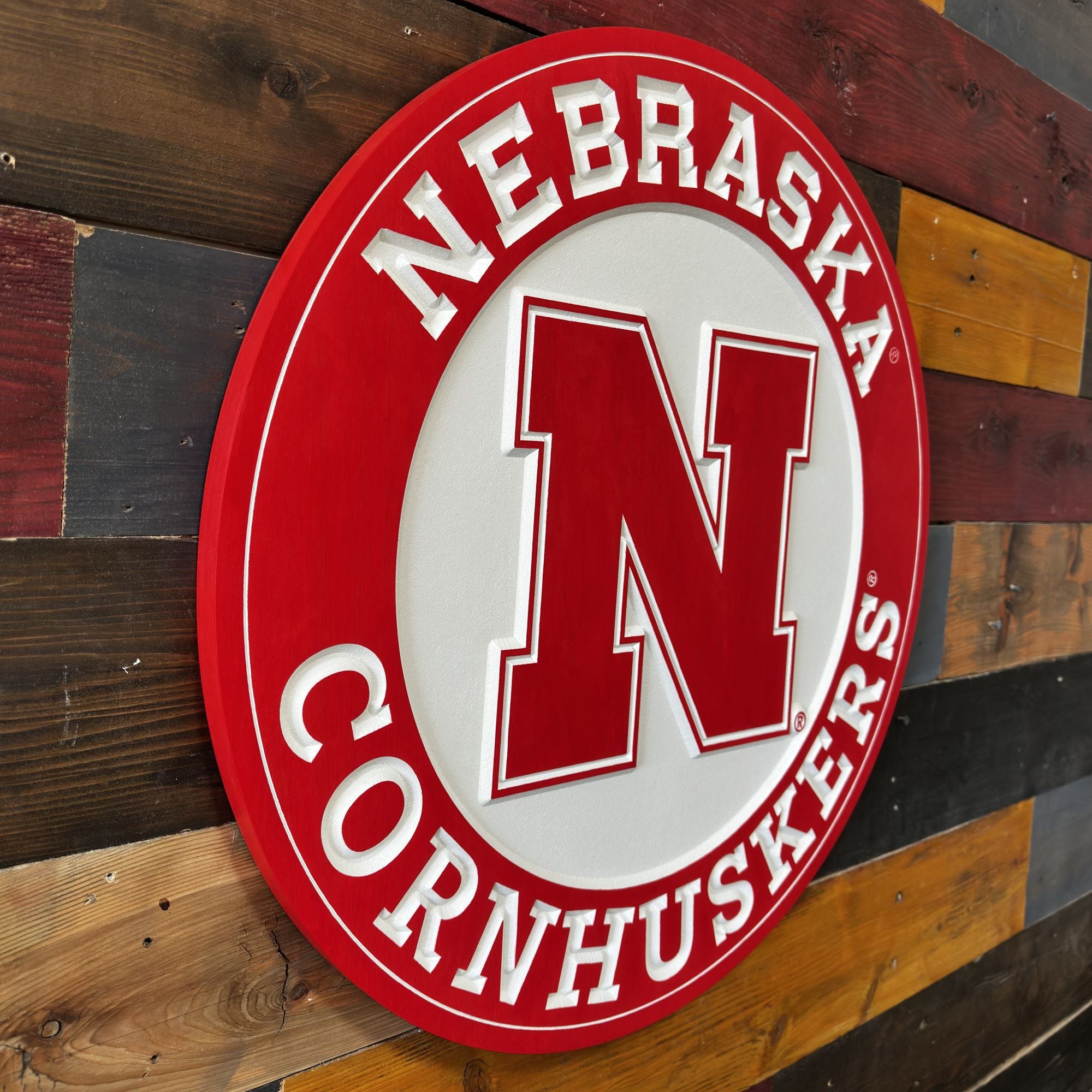 Nebraska Cornhuskers logo swimming