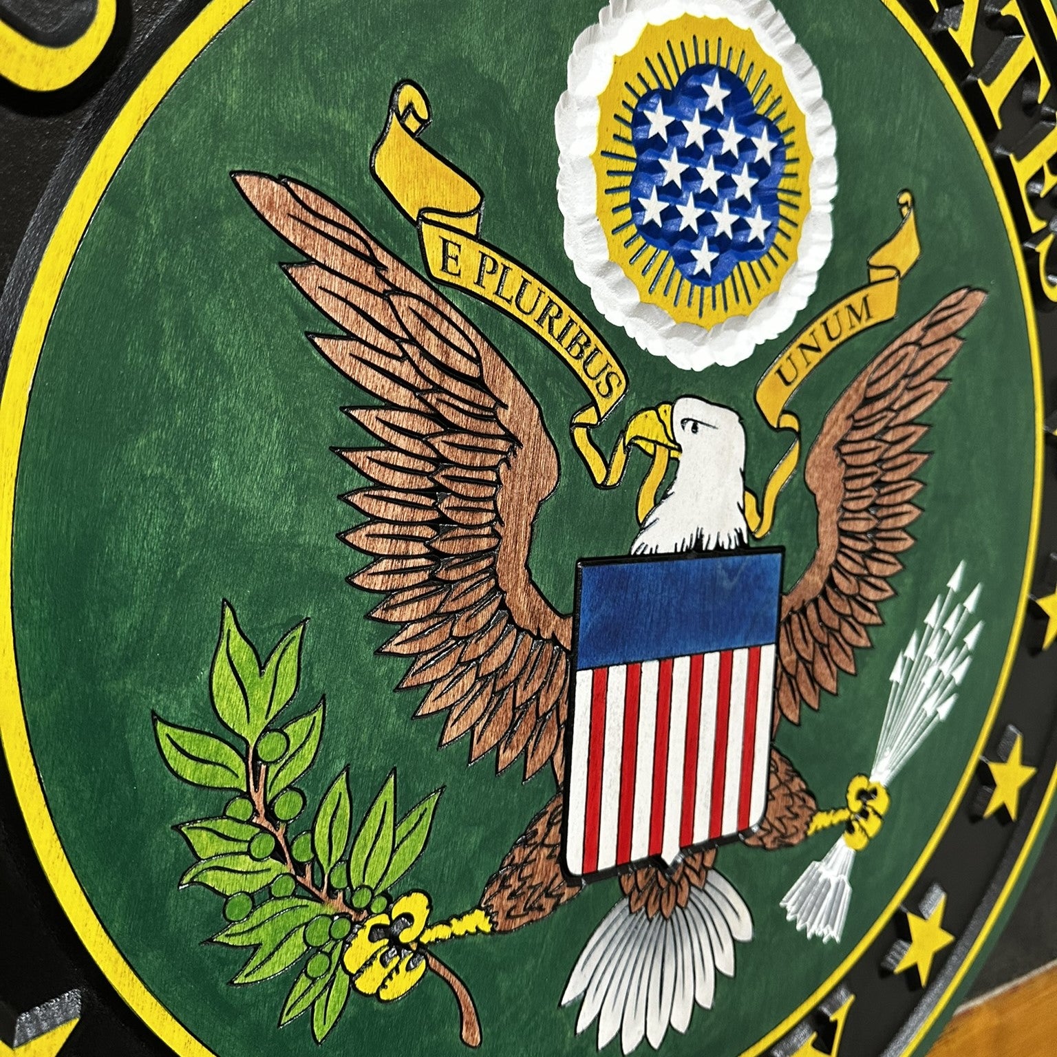 United States Army wood sign hanging on wall with premium wire backing and bold carved emblem