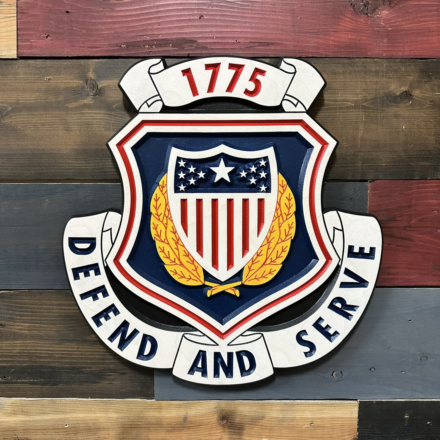 Close up detail of US Army Adjutant General Corps carved wood wall sign showing raised shield and laurel branches