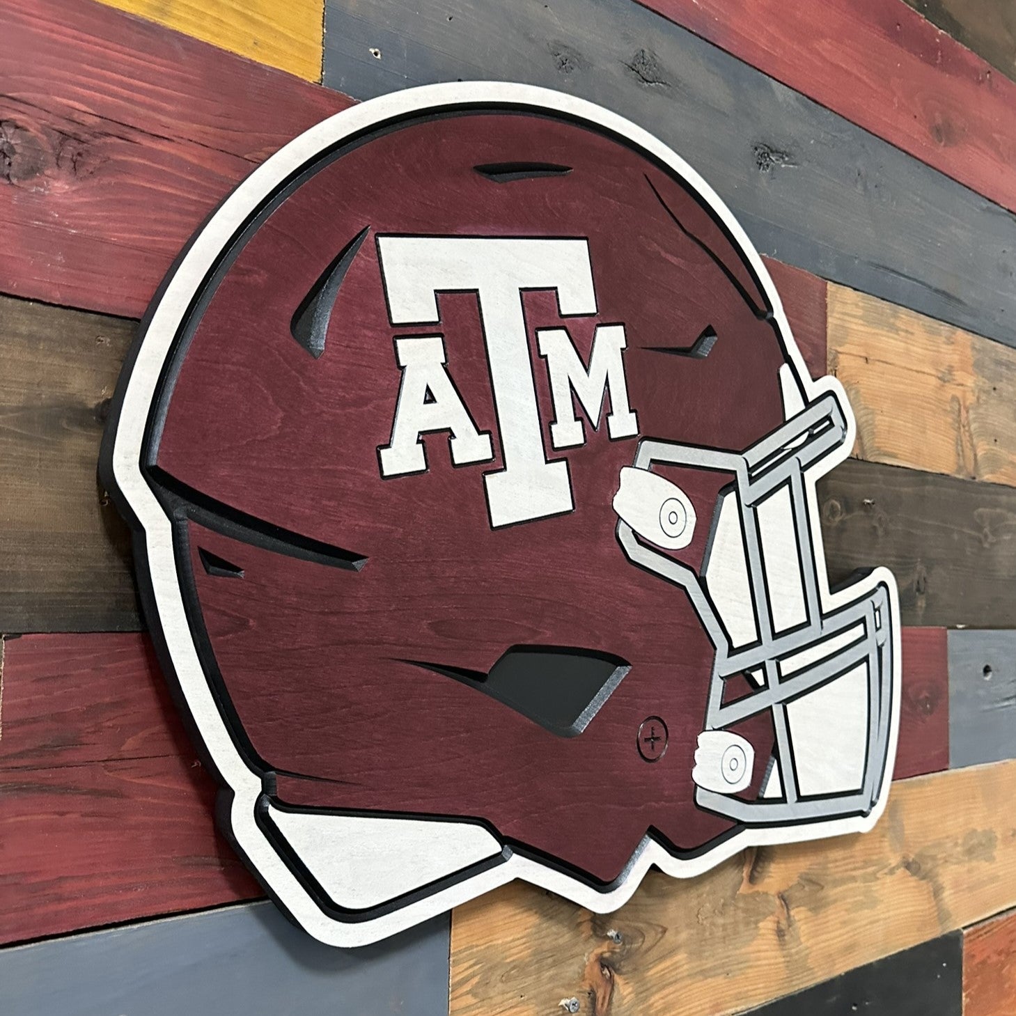 Official Texas A&M Aggies wood sign featuring a maroon football helmet with ATM logo