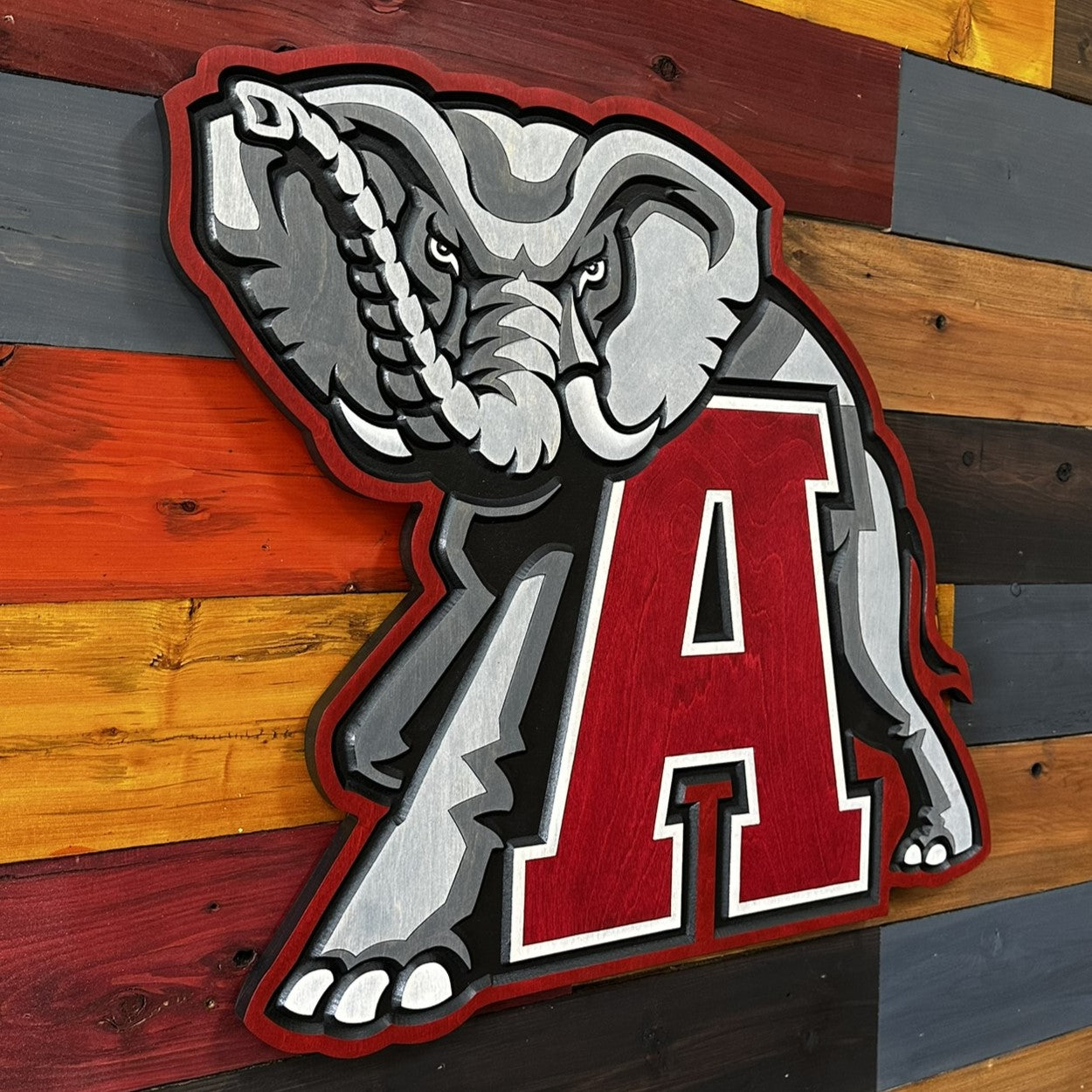 Angled view of Alabama Crimson A elephant wood sign