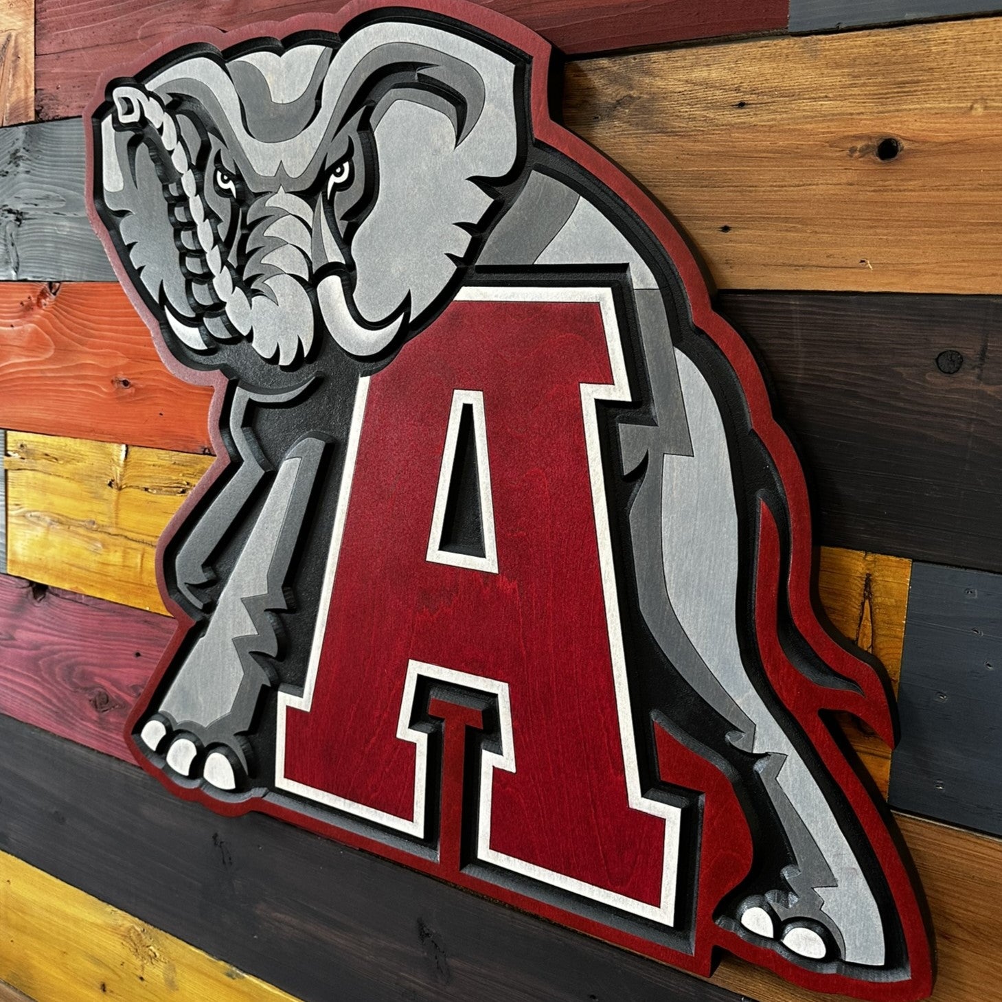 Alabama Crimson A elephant wood sign displayed on wall