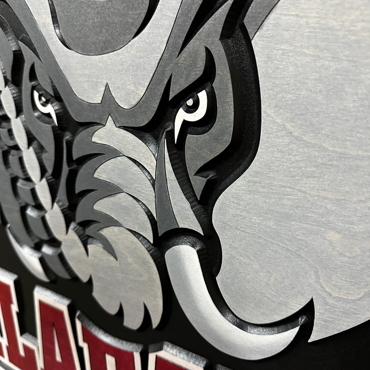 Alabama Crimson Tide elephant head logo wood sign displayed on wall