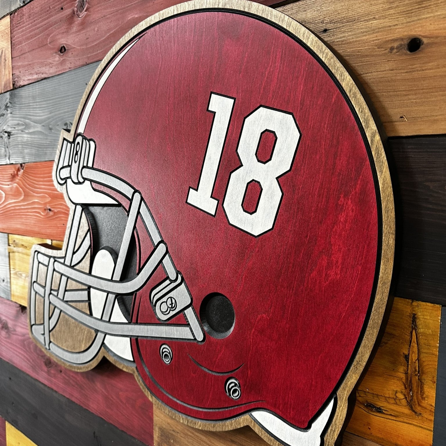 Angled view of Alabama Crimson Tide 18 championships wood sign