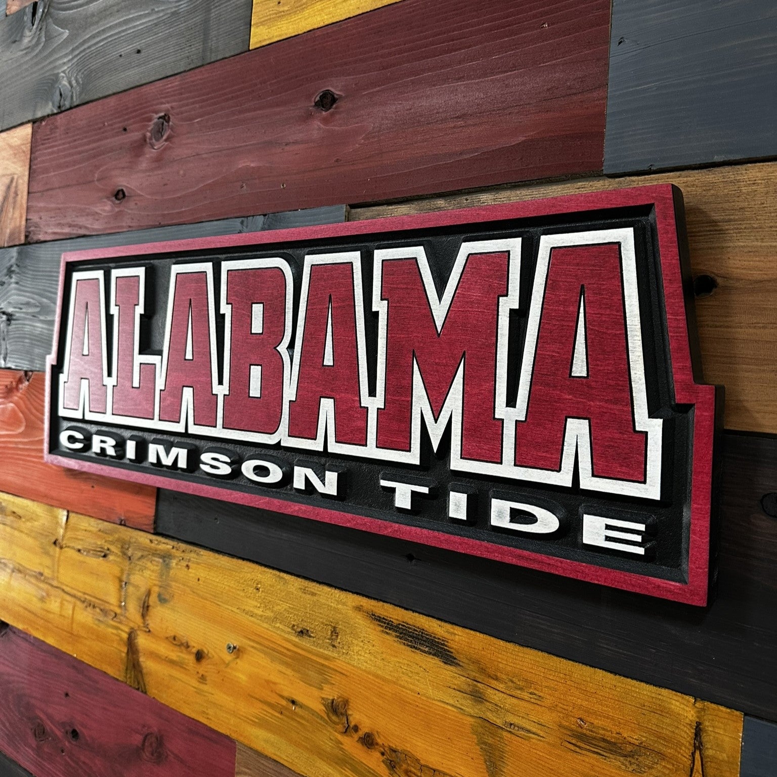 Alabama Crimson Tide wood sign displayed on wall