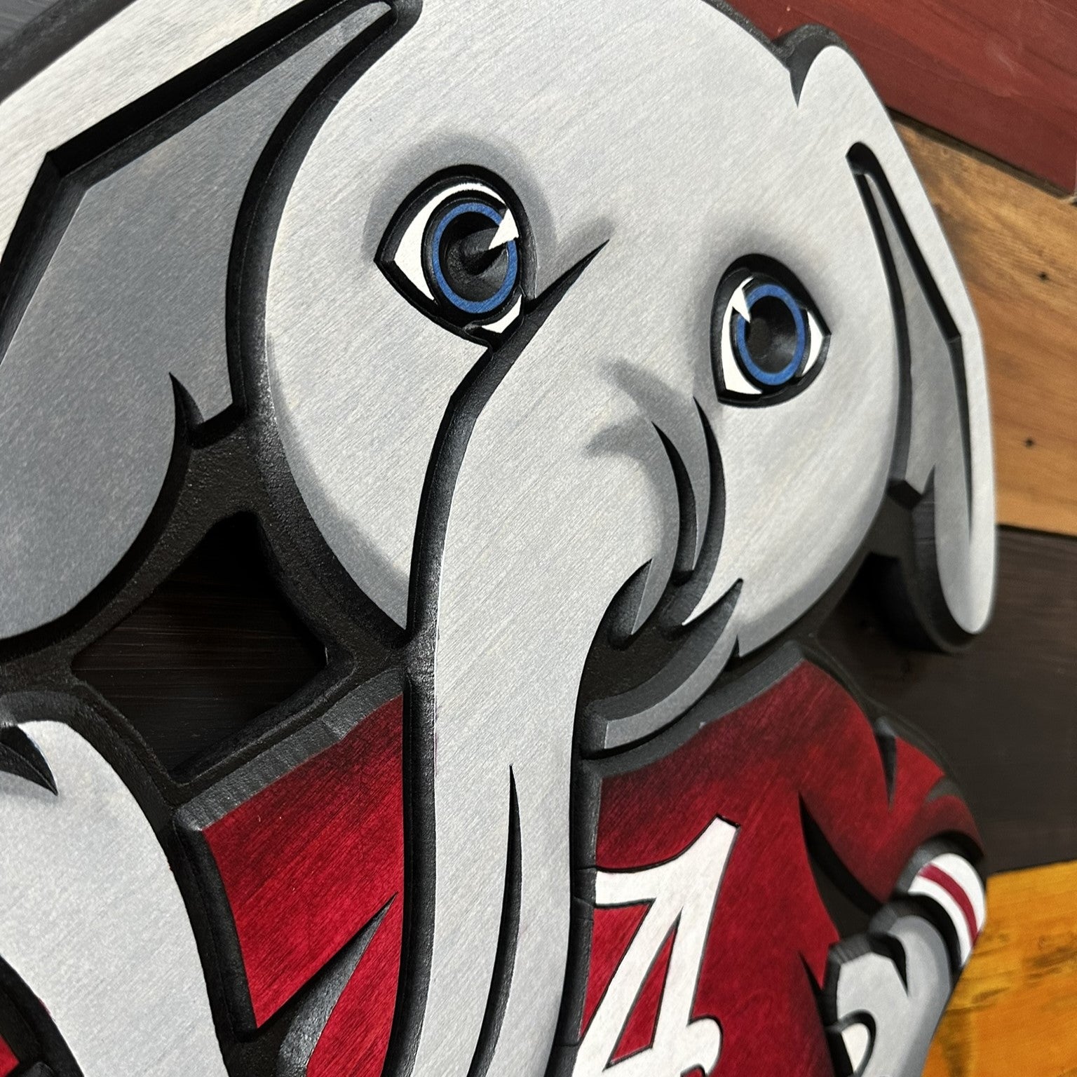 Big Al Alabama mascot wood sign displayed on wall