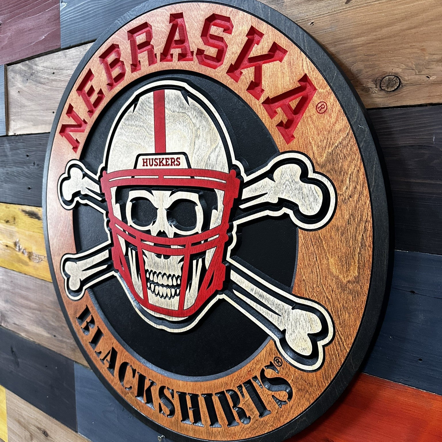 Wooden sign with Nebraska Blackshirts 