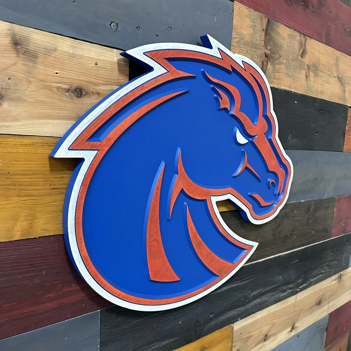 Dimensional Boise State Broncos carved wood sign showing raised and recessed logo details