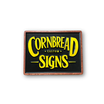 Cornbread Custom Signs retro yellow wood sign with black background and stained wood border on white background