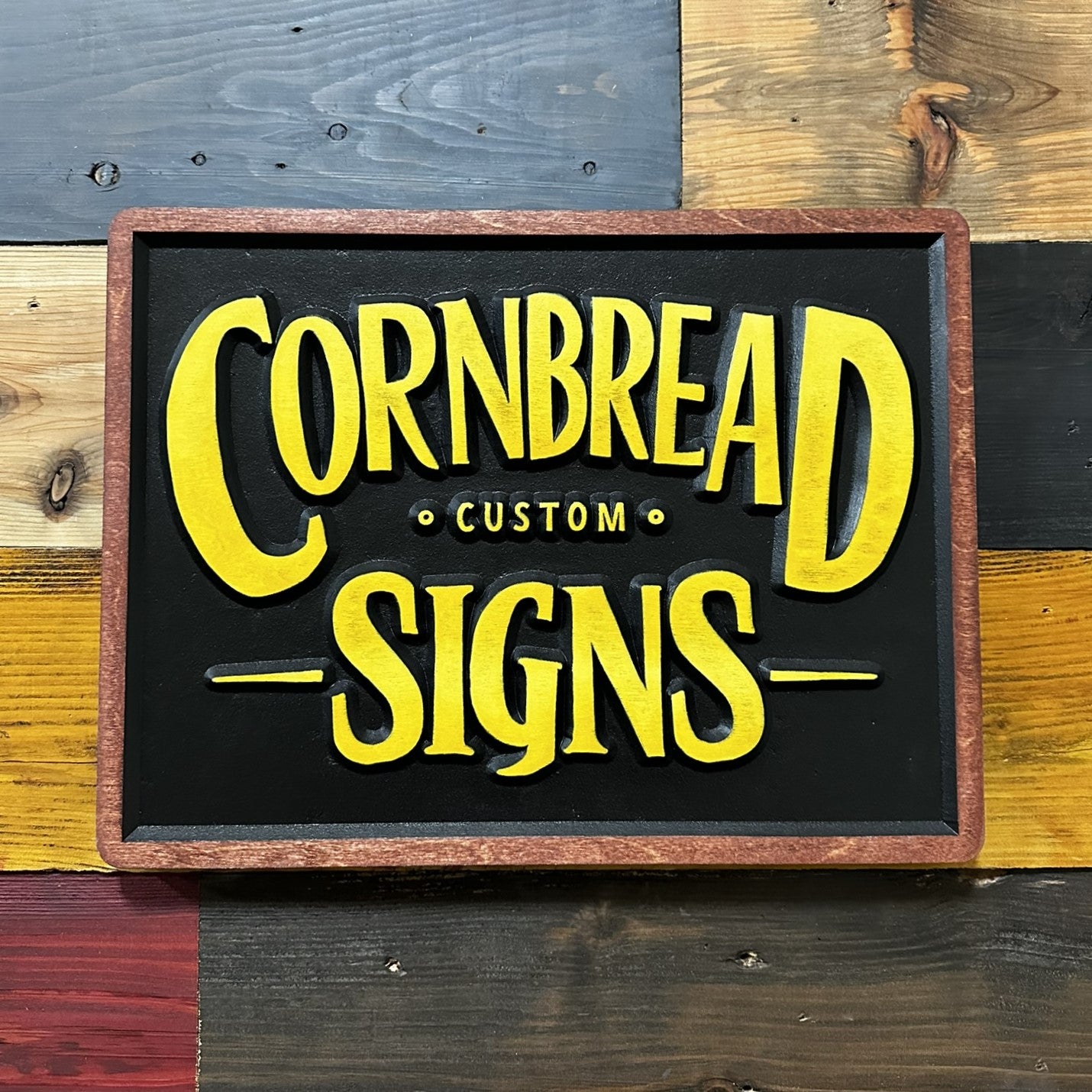 Cornbread Custom Signs vintage yellow logo wood wall sign handcrafted in Nebraska
