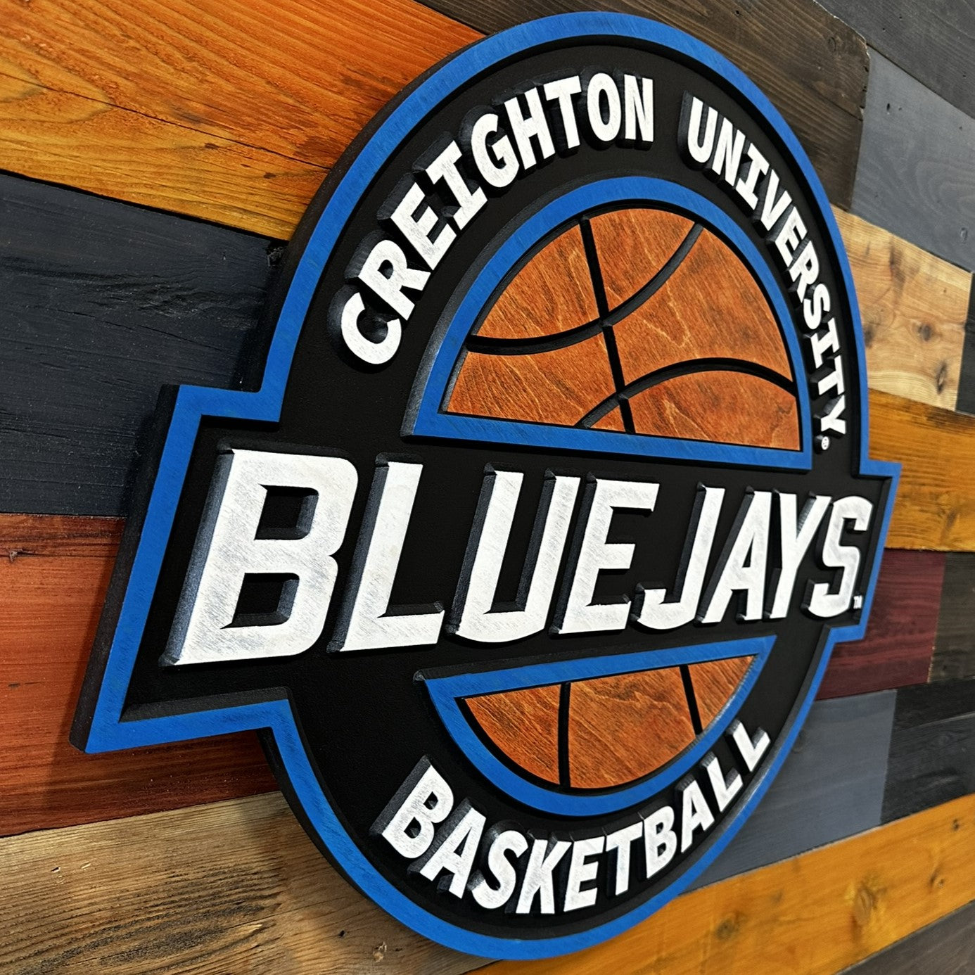 Angled view of Creighton Bluejays basketball wood sign