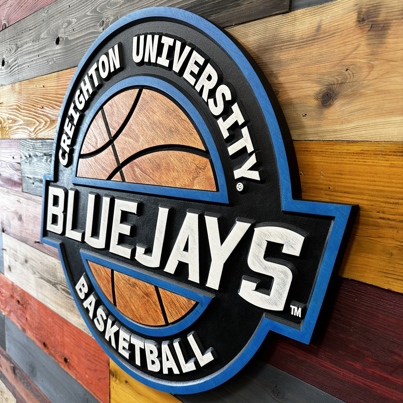 Creighton Bluejays basketball wood sign displayed on wall