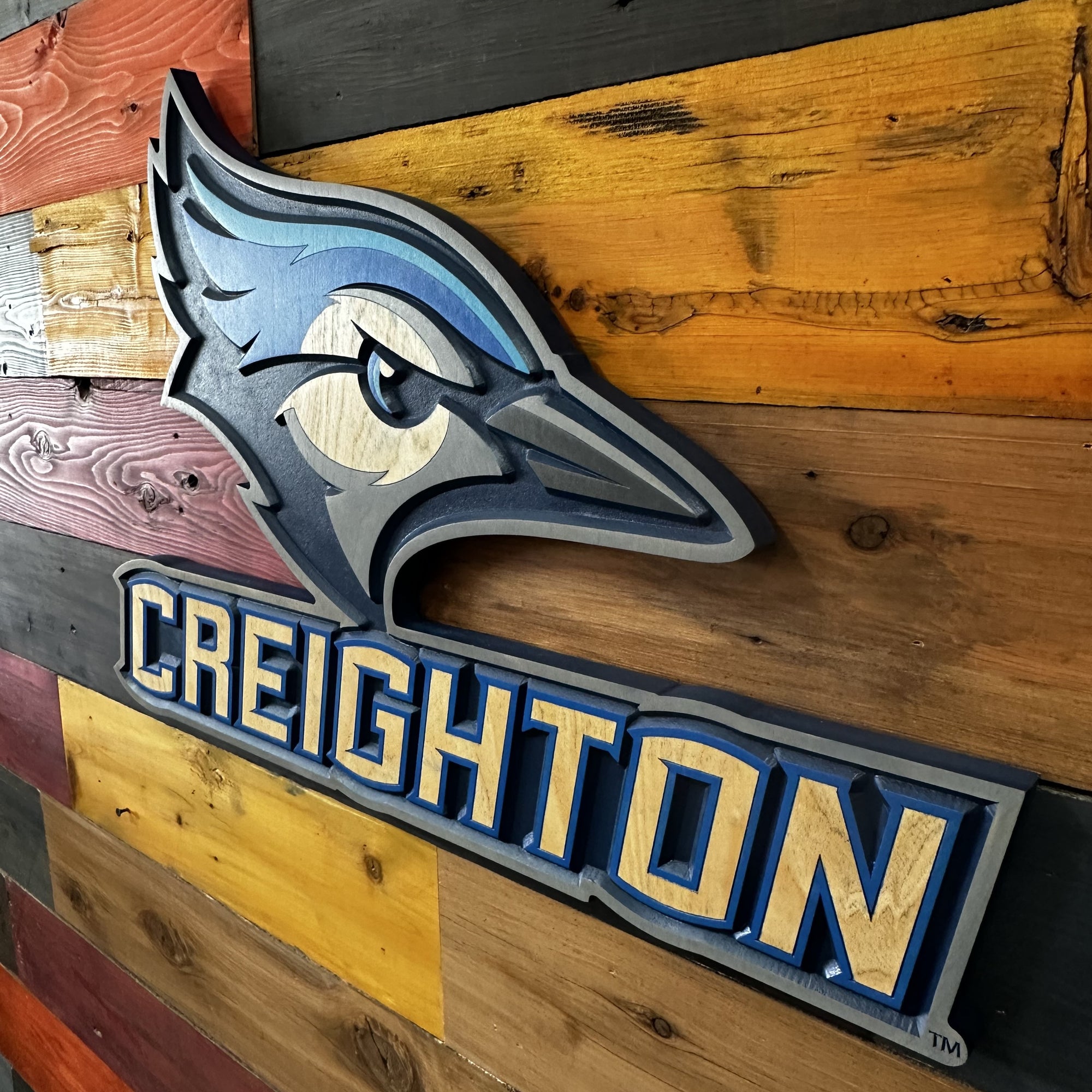Angled view of Creighton Bluejays Billy wood sign