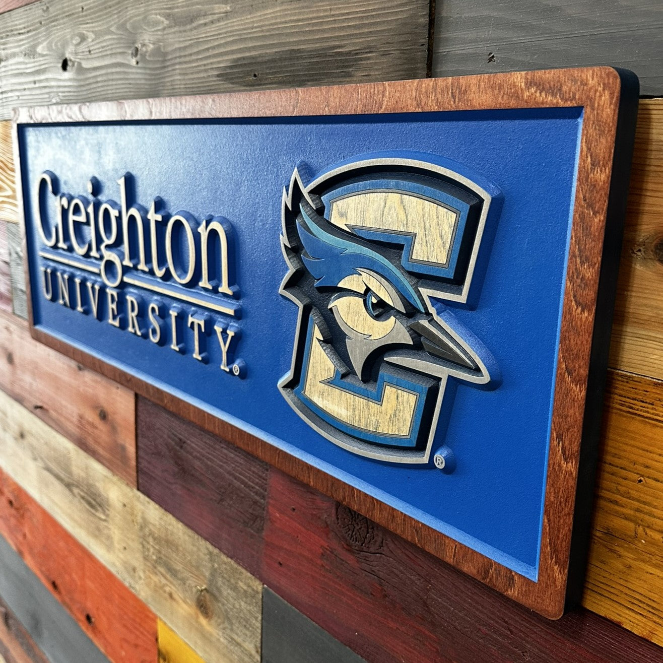 Side profile of Creighton University horizontal wood sign
