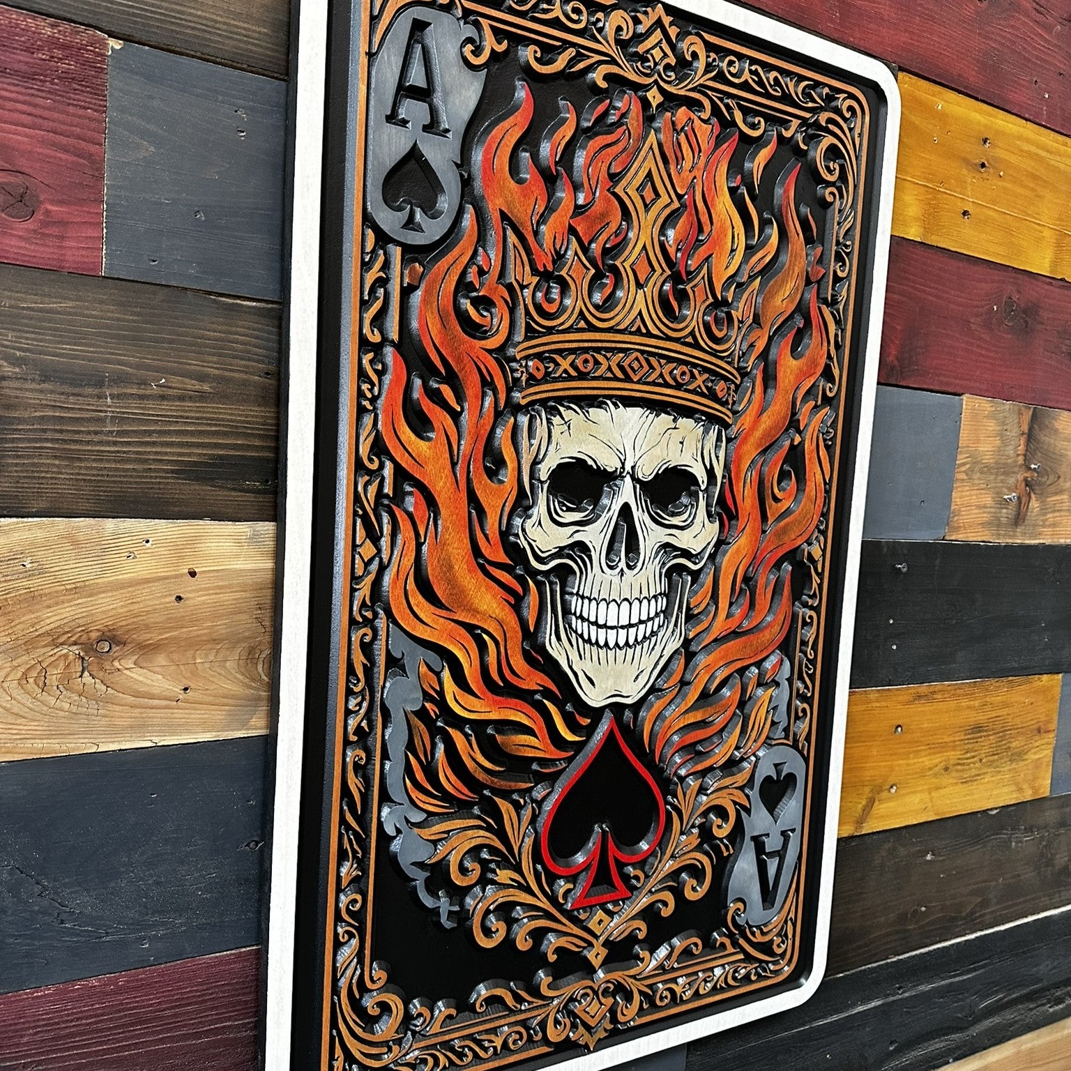 Crowned skull playing card wood sign with flames and Ace of Spades artwork