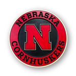 Nebraska Cornhuskers logo on a red and black background wood sign