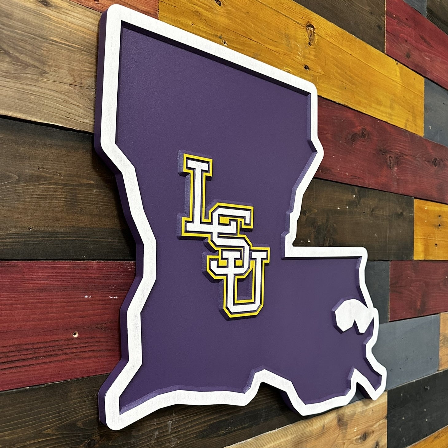 Side profile of Louisiana shaped LSU Tigers carved wood sign highlighting layered construction and dimensional carved depth