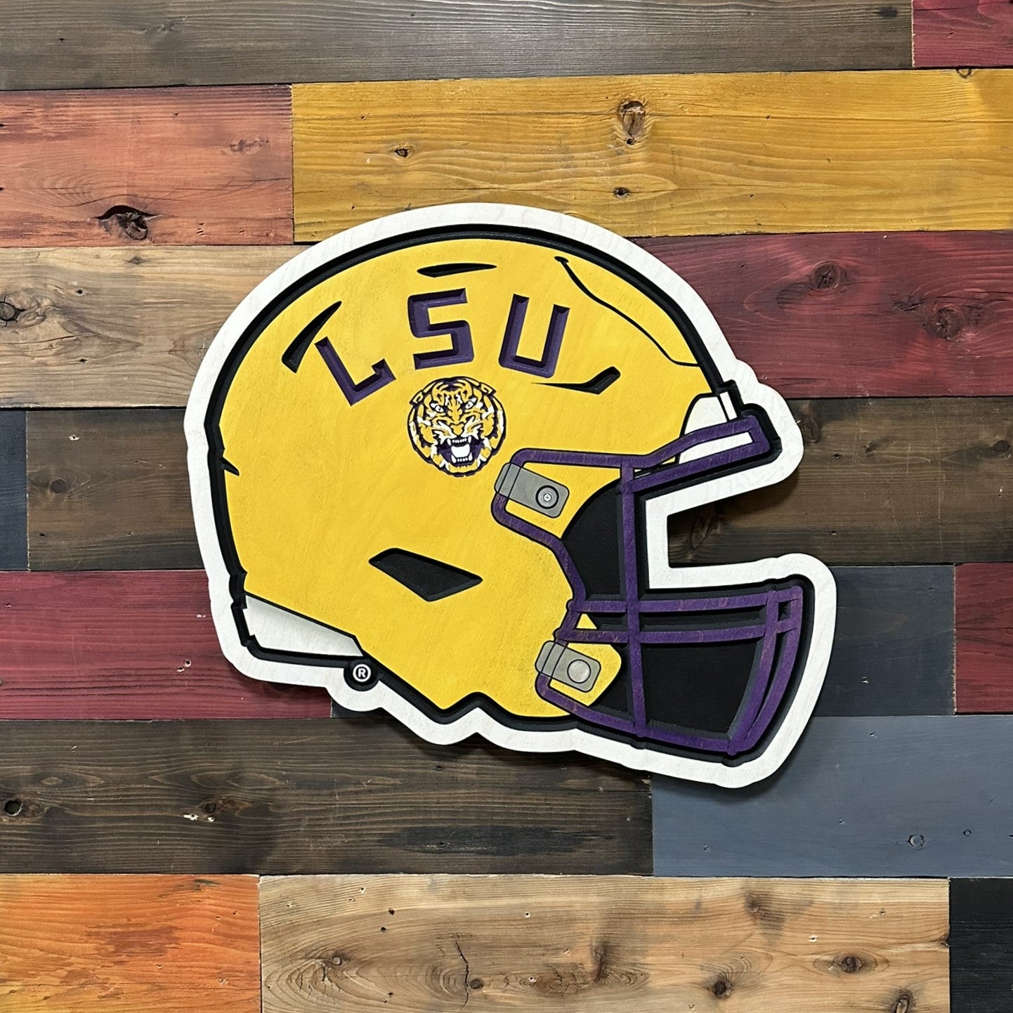 Handcrafted LSU Tigers football helmet wall art featuring the iconic purple and gold helmet design