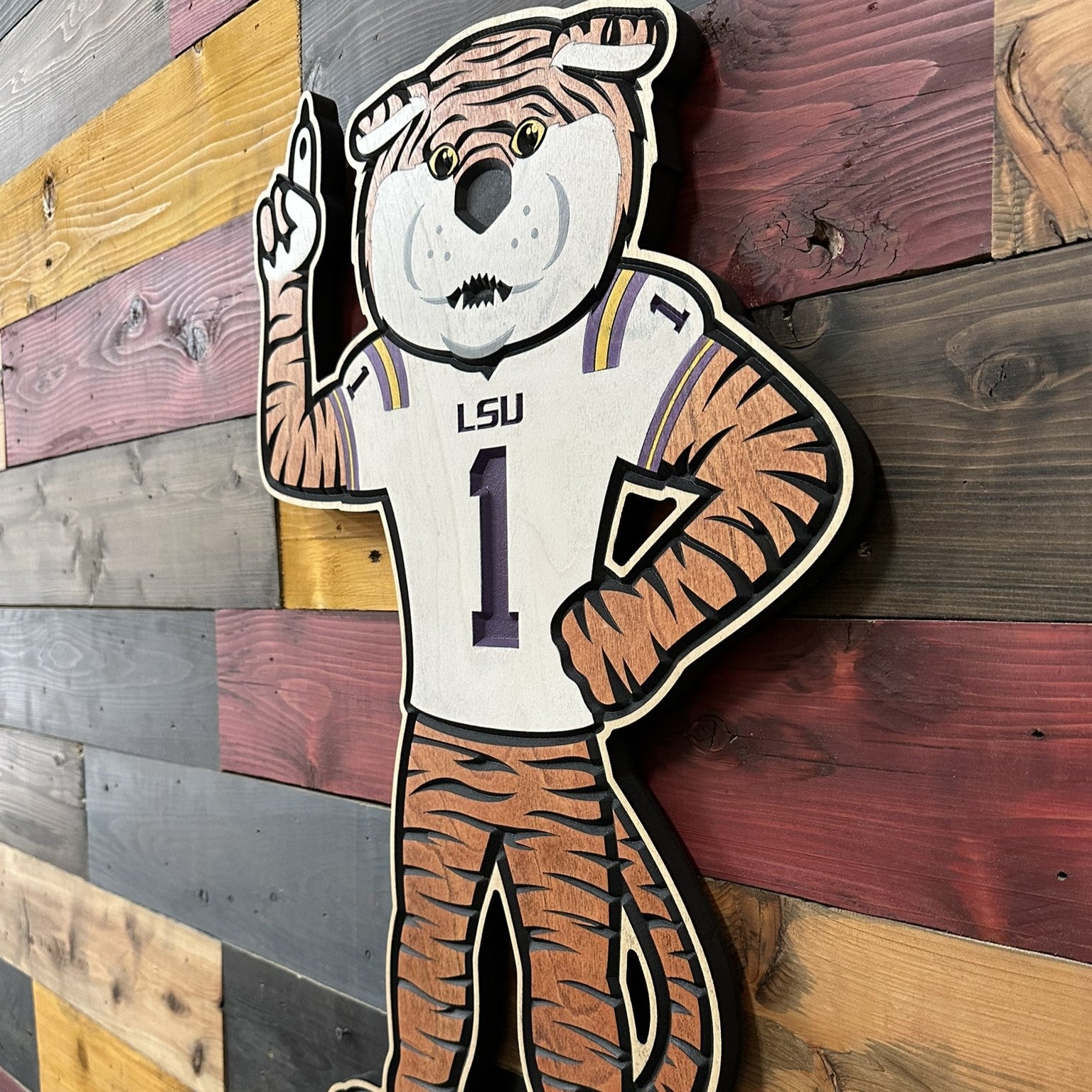 Official LSU football mascot wood sign featuring Mike the Tiger wearing an LSU football jersey