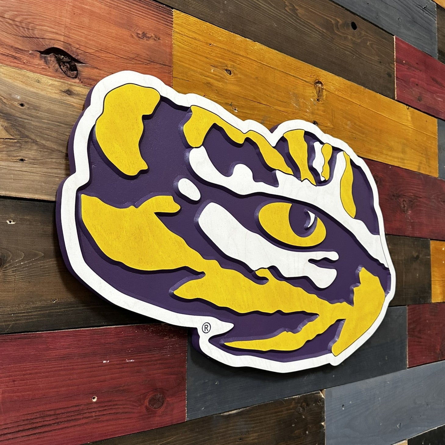 Side profile of LSU Tigers Tiger Eye carved wood sign highlighting dimensional layered construction and carved depth detail