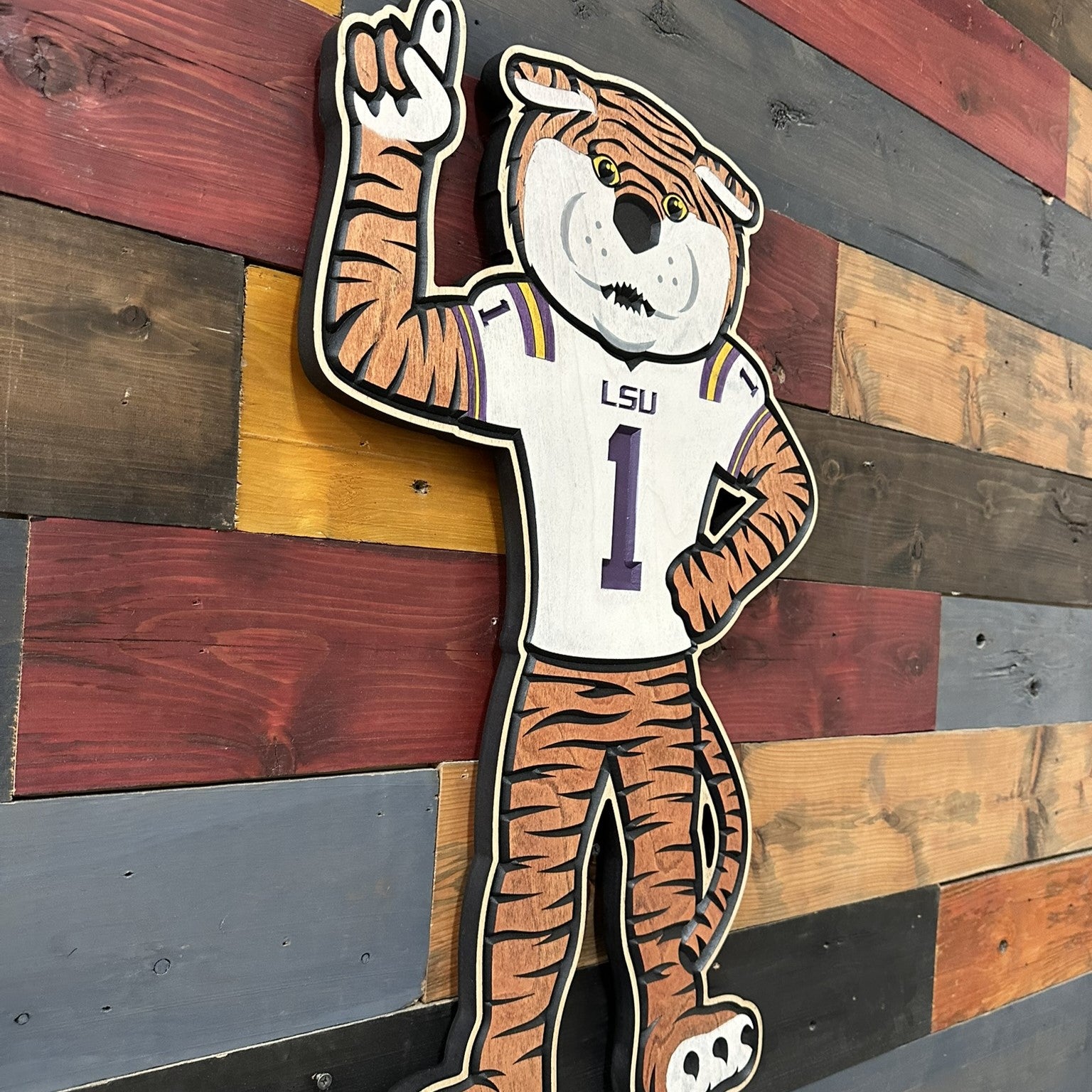LSU Tigers football fan cave wall decor featuring Mike the Tiger mascot and football themed design