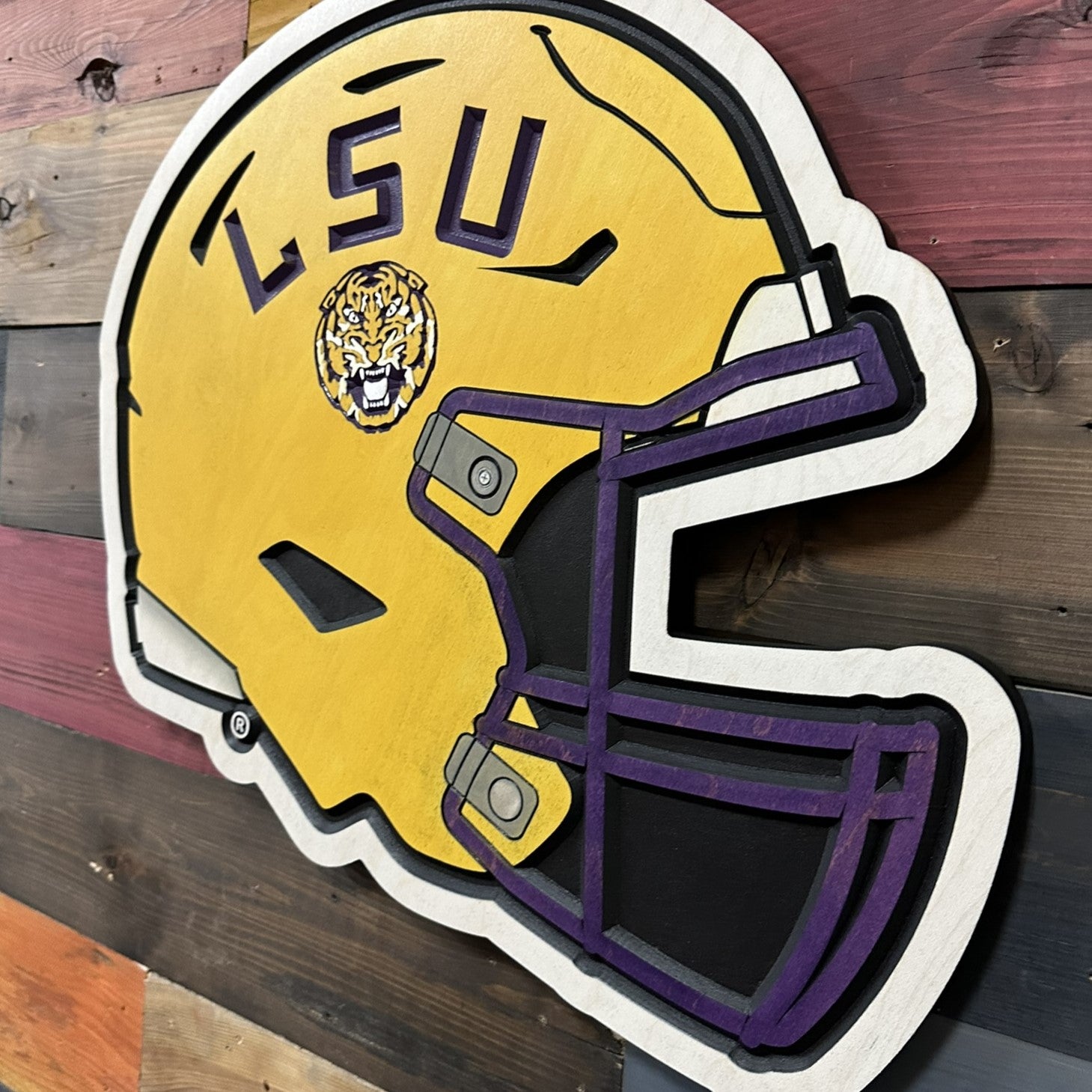Official LSU Tigers wood sign featuring a football helmet with LSU lettering and tiger logo
