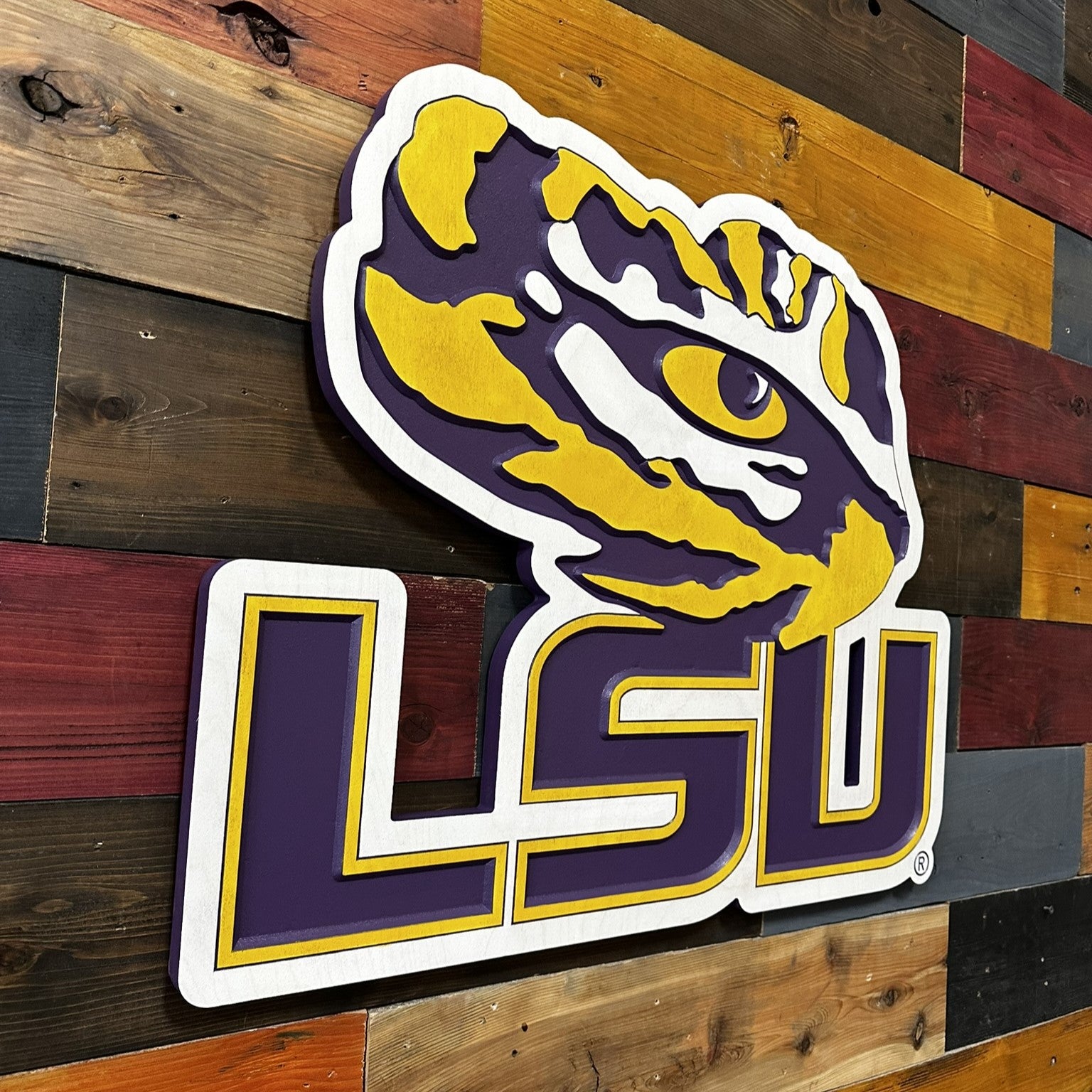 Side profile of LSU Tigers Tiger Eye LSU logo carved wood sign showing layered construction and dimensional carved depth