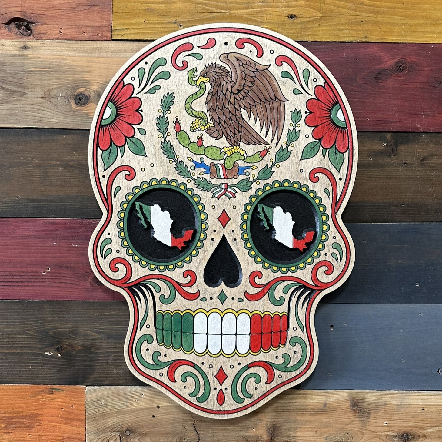 Día de los Muertos inspired Mexican skull wall art with eagle and serpent crest, floral details, and Mexican flag colors