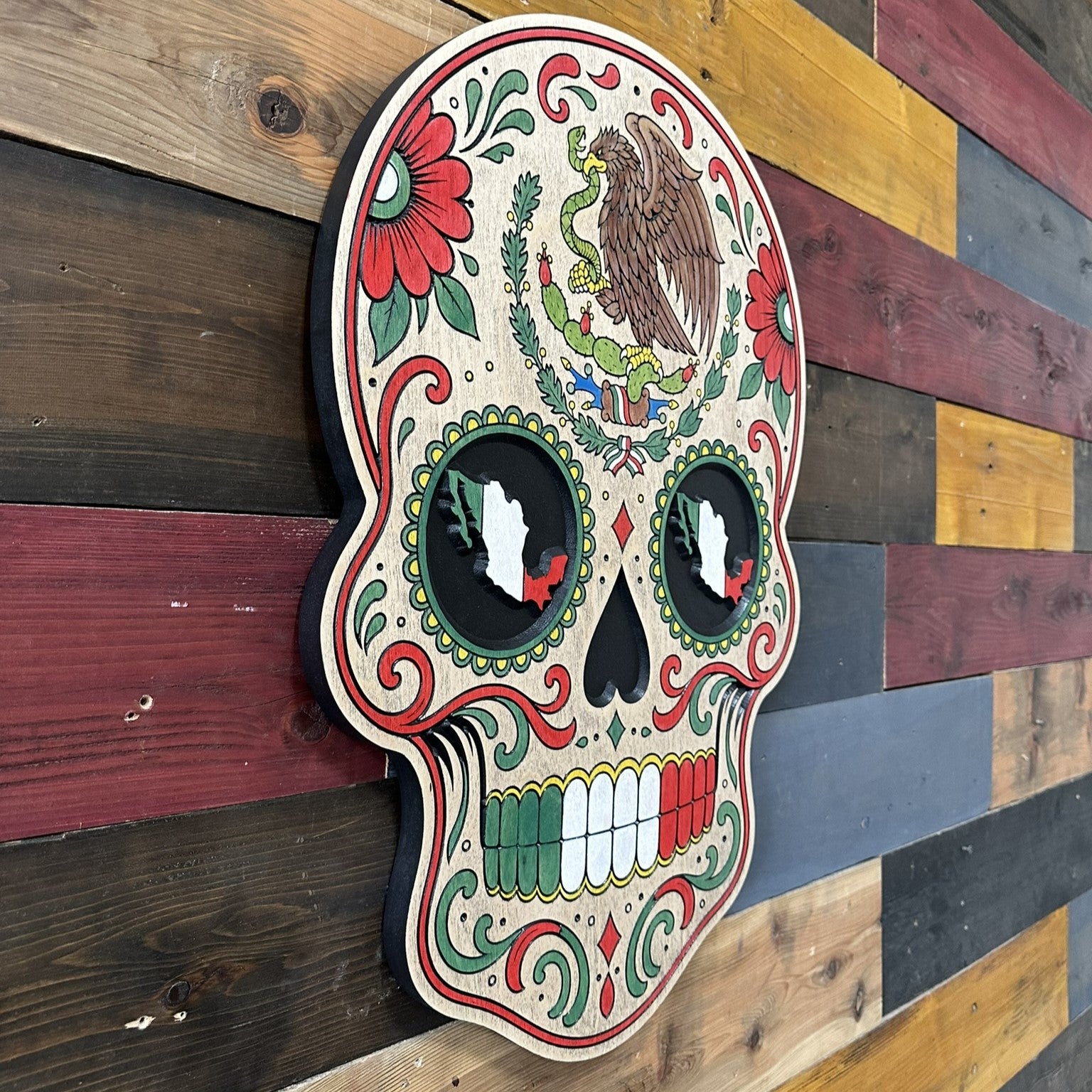 Detailed Mexican heritage sugar skull wall art handcrafted from carved wood with traditional Mexico inspired artwork
