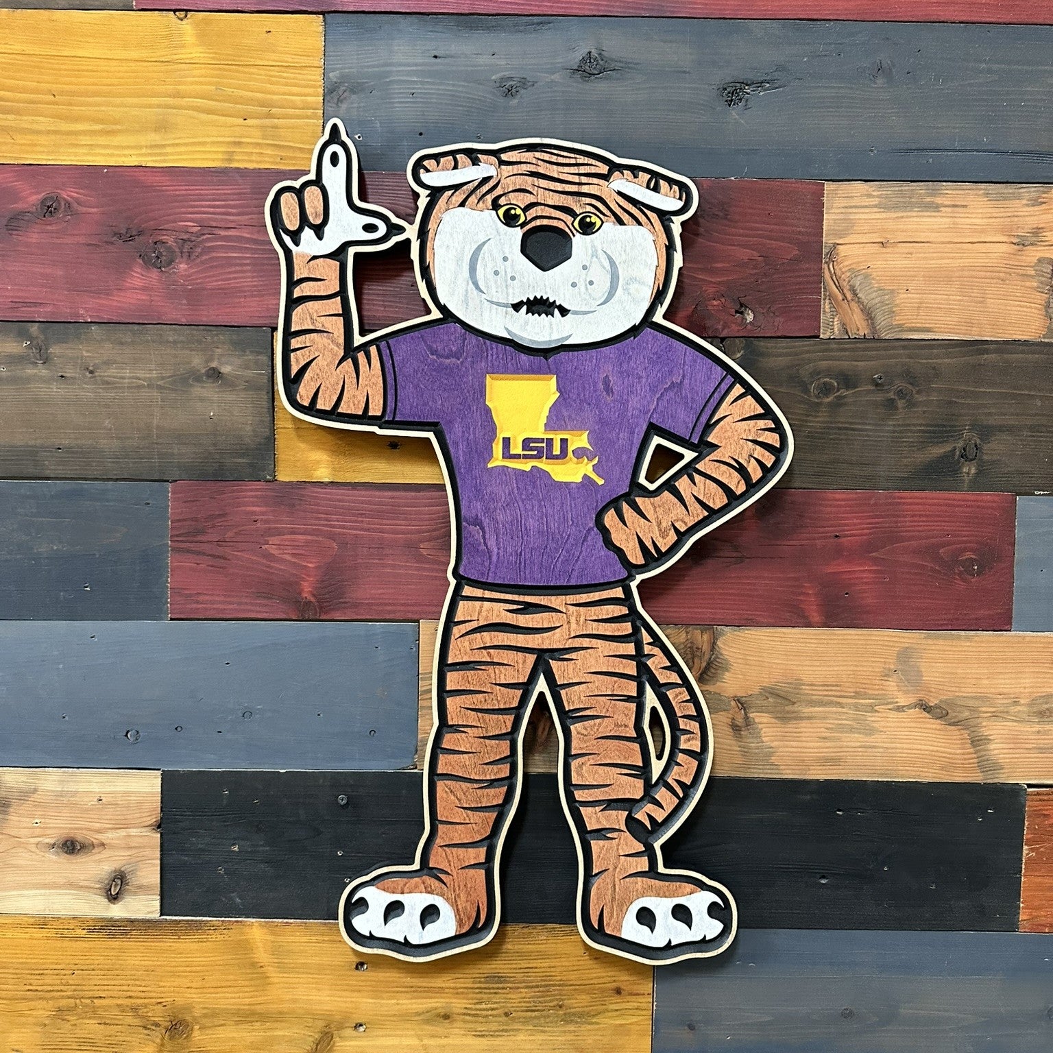 Handcrafted LSU Mike the Tiger mascot wall art featuring the LSU mascot wearing a purple LSU shirt