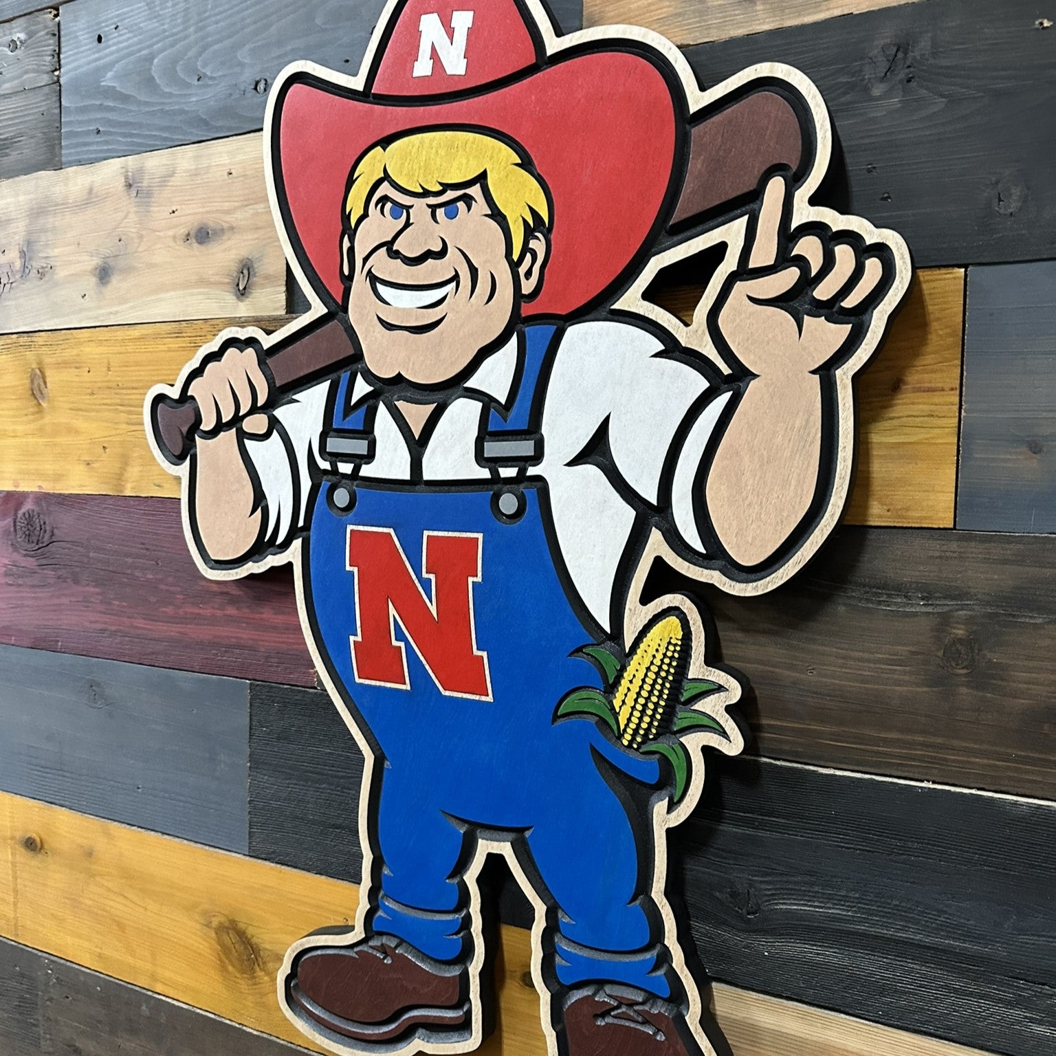 Nebraska baseball Herbie Husker wood sign displayed as Cornhuskers wall decor