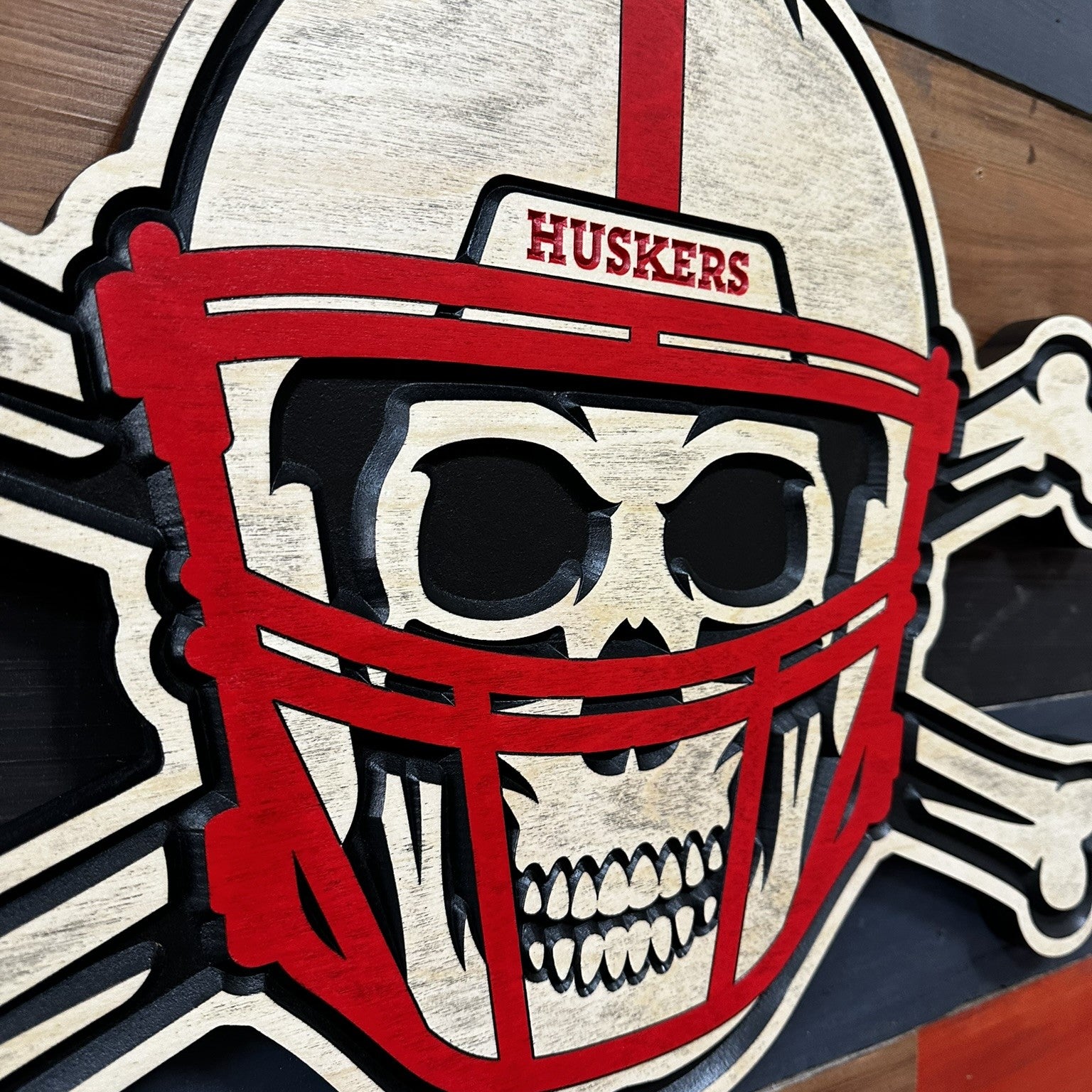 Nebraska Blackshirts skull and bones sign displayed on wall