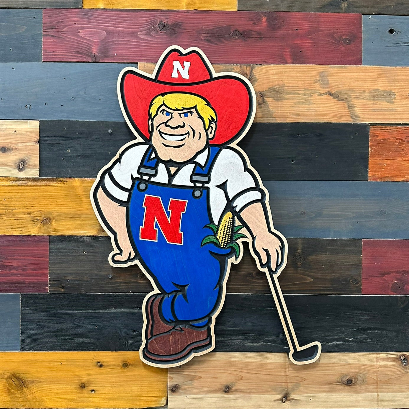Nebraska Cornhuskers Herbie Husker golf sign featuring Herbie holding a golf club