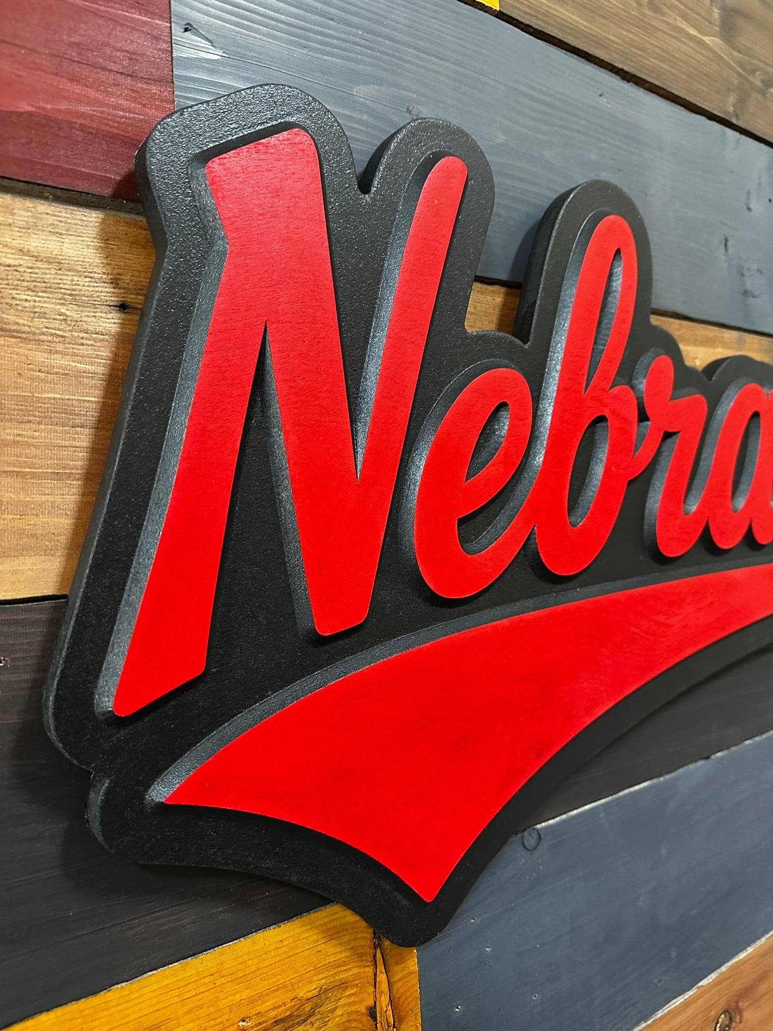 Detail view of carved Nebraska Cornhuskers jersey font design