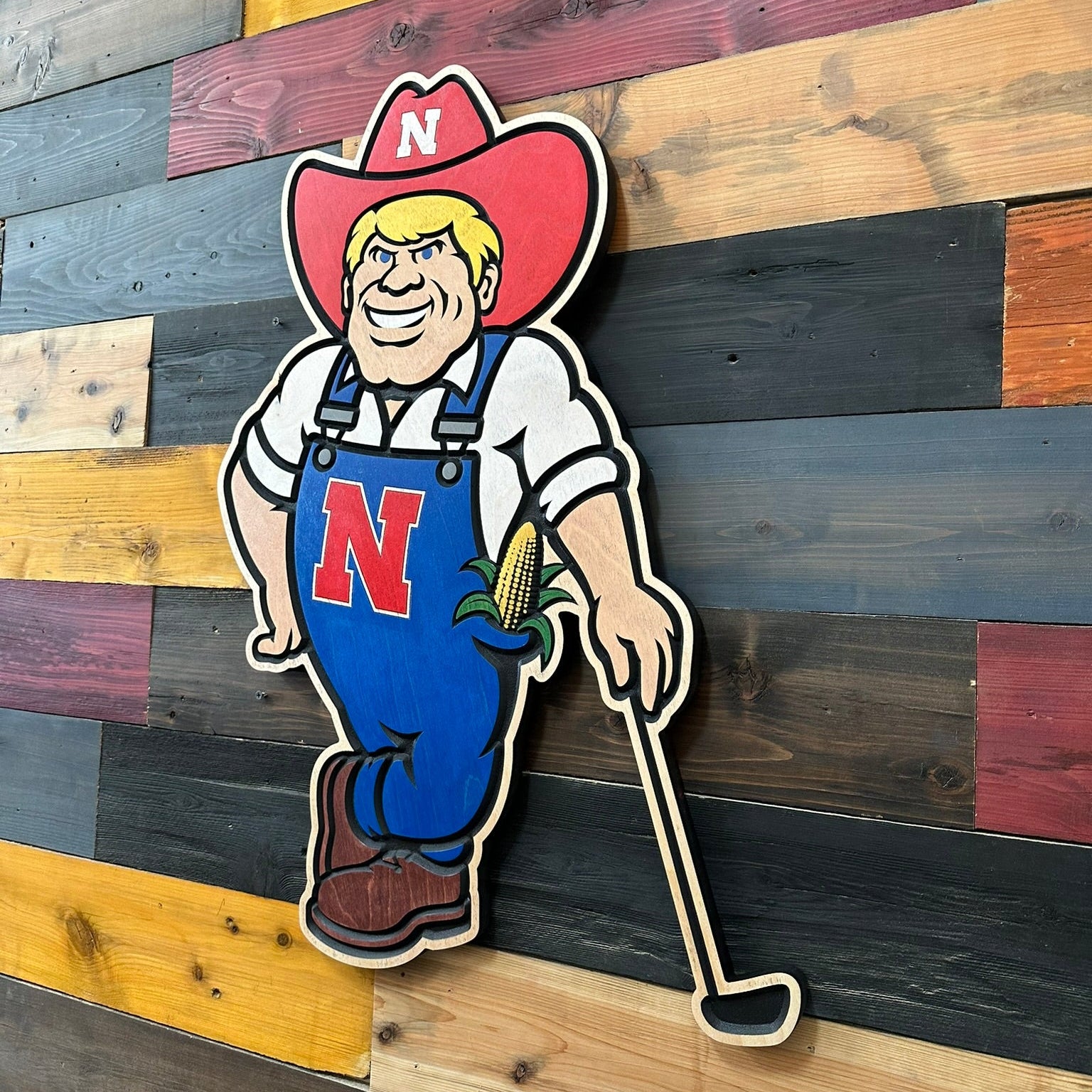 Nebraska Husker golf gift featuring officially licensed Herbie Husker carved wood artwork