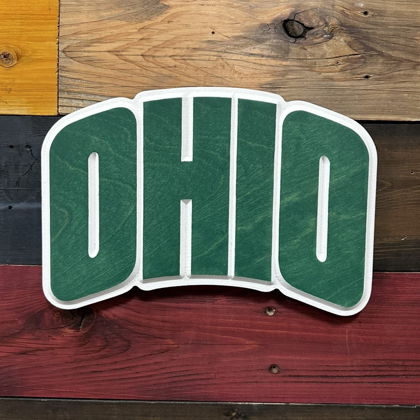 Angled view of Ohio University Bobcats OHIO dimensional carved wood wall sign with handcrafted detail