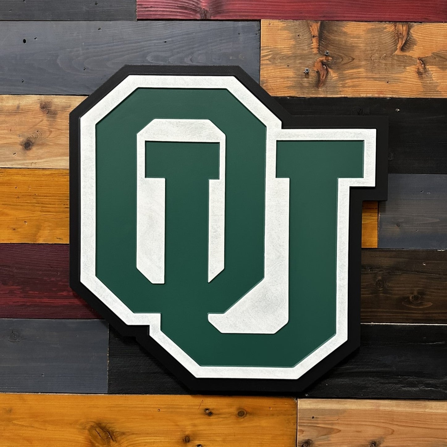 Side profile of Ohio University OU 3D carved wood sign showing layered construction and dimensional thickness