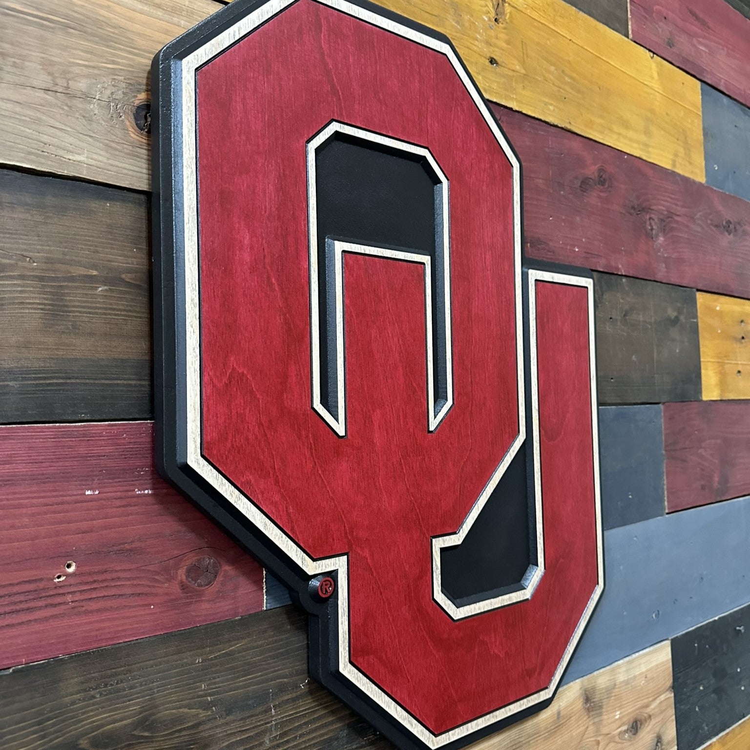 Official Oklahoma Sooners wood sign featuring the iconic crimson and cream OU logo design