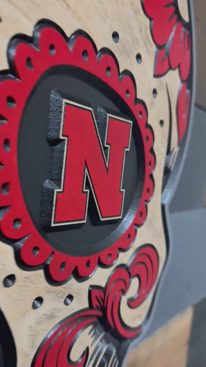 Video of Huskers sugar skull wood sign