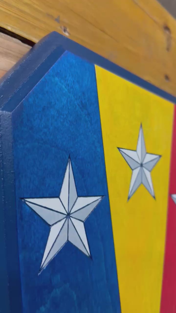 Close up detail of 50th Infantry Brigade Combat Team Combat Service Identification Badge wood sign