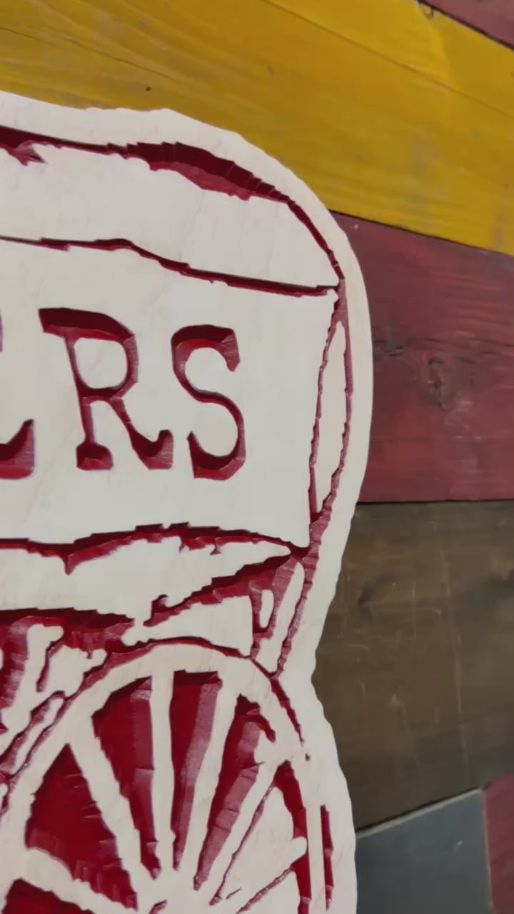 Video showcasing an officially licensed Oklahoma Sooners Schooner wood sign handcrafted in Nebraska with precision CNC carving and detailed finishing