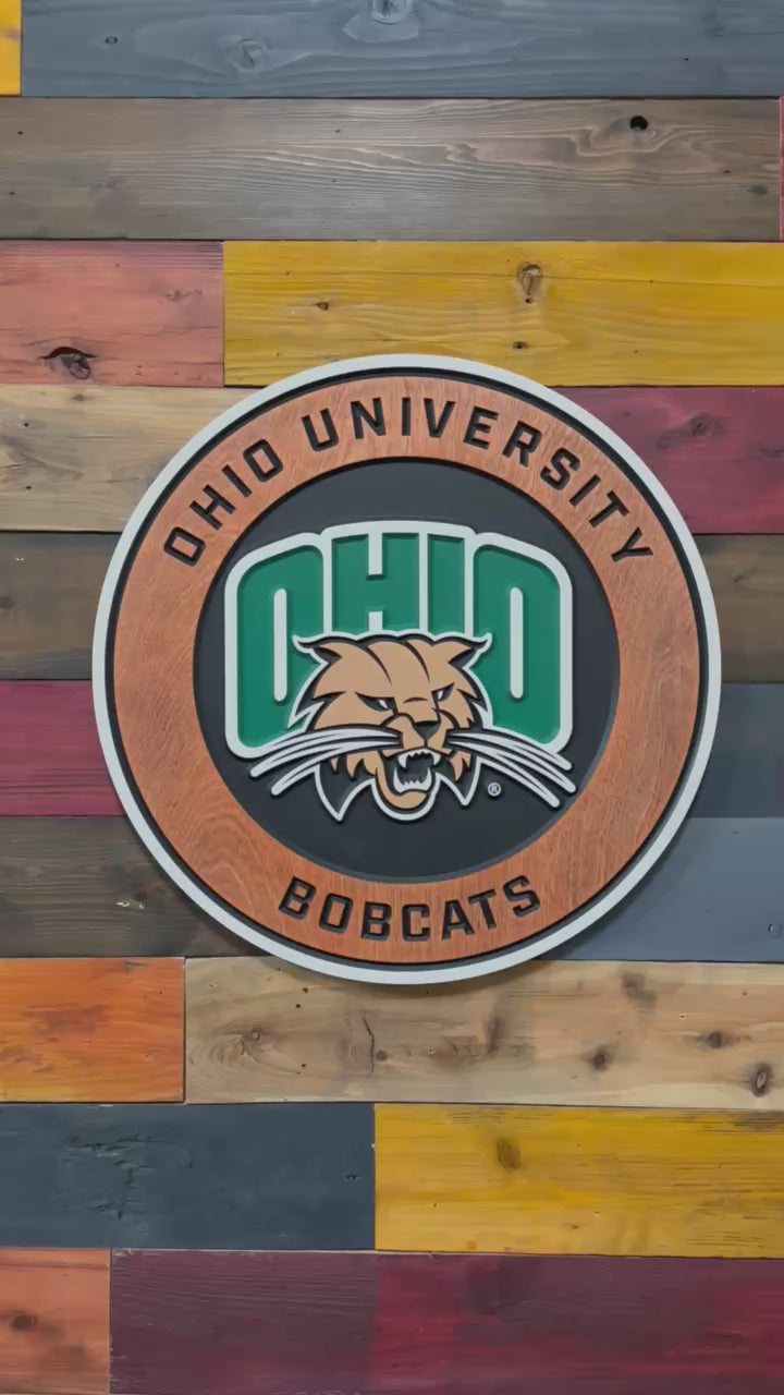 Video showcasing the layered carving depth, stained wood border, and dimensional Ohio University Bobcats logo craftsmanship
