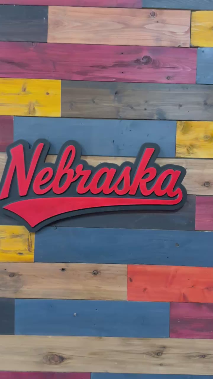 Video of Nebraska Cornhuskers jersey font wood sign